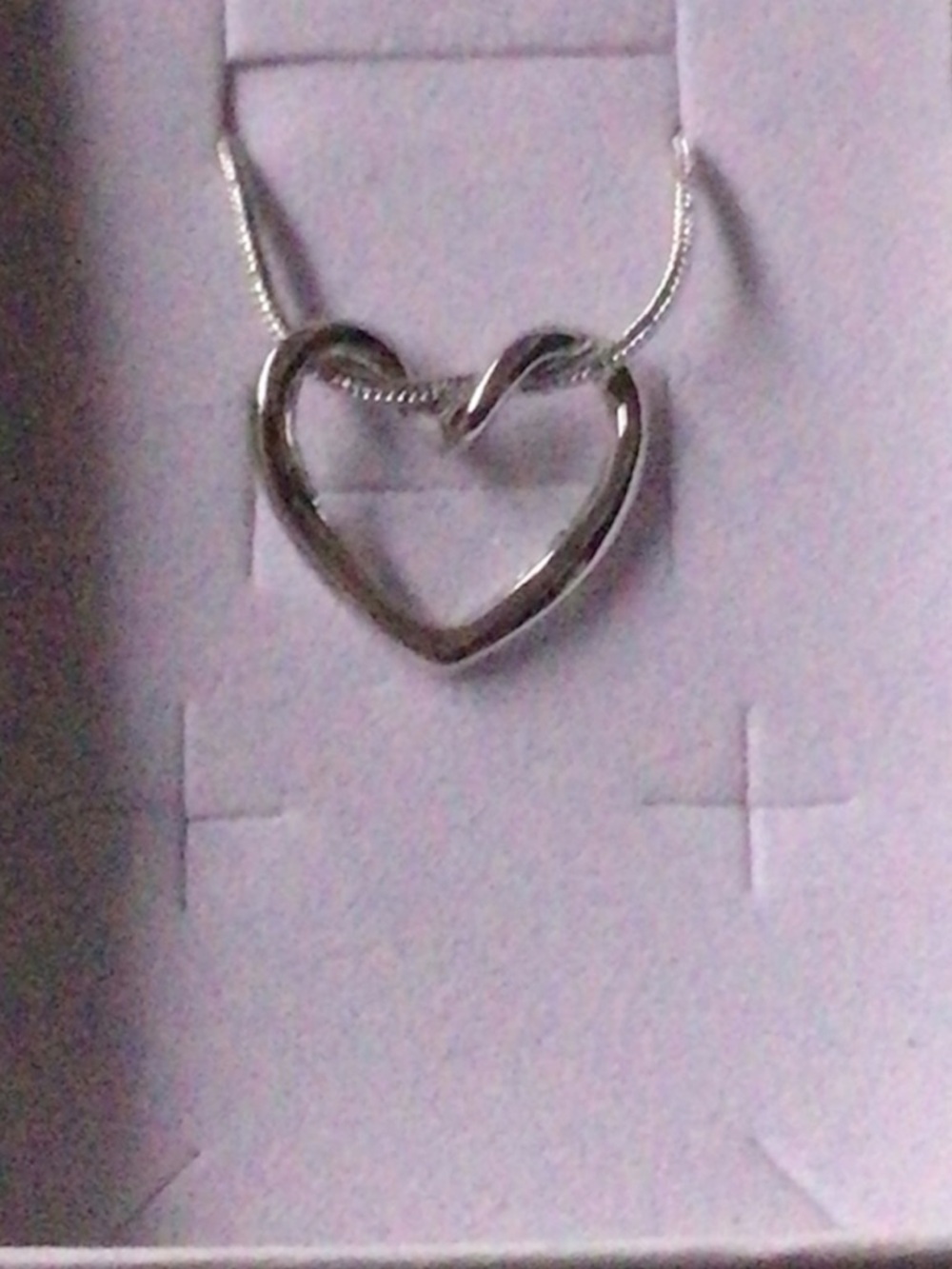Womens Silver Floating Heart Pendant Necklace .